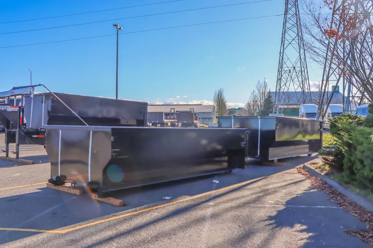 Roll-off dumpster ready for waste disposal at job site for Commercial Dumpster Rental in Sumpter